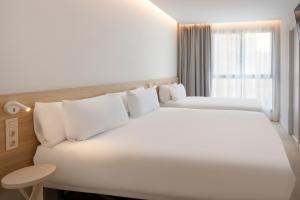 B&B HOTEL Alicante Centro客房内的一张或多张床位