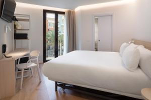 B&B HOTEL Alicante Centro客房内的一张或多张床位