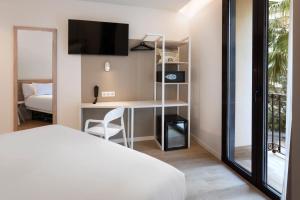 B&B HOTEL Alicante Centro客房内的一张或多张床位