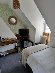 Postel nebo postele na pokoji v ubytování The Wincheap B&B