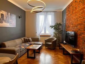 Μια τηλεόραση ή/και κέντρο ψυχαγωγίας στο Zamkowy Apartament