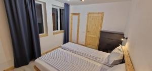 En eller flere senge i et værelse på Old town luxury apartment