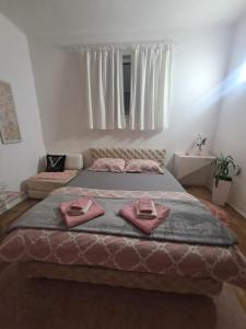 Una cama o camas en una habitación de Stan na dan S