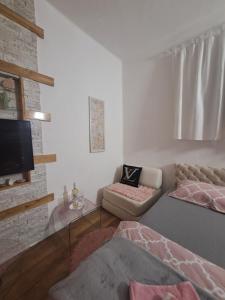 Una cama o camas en una habitación de Stan na dan S