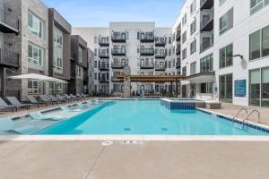 an empty swimming pool in an apartment building at My Sweet Rentals- 30 night min in Aurora