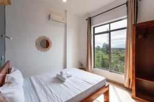 Katil atau katil-katil dalam bilik di Lulubay Serviced Appartments +176 gambar