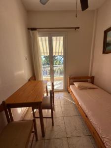 Posteľ alebo postele v izbe v ubytovaní Tsatsalmas Rooms with sea View + 23 fotografií