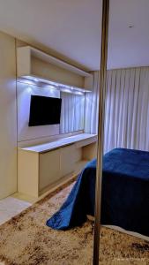 Televisyen dan/atau pusat hiburan di Gih Guest House Parque Beto Carrero +95 gambar