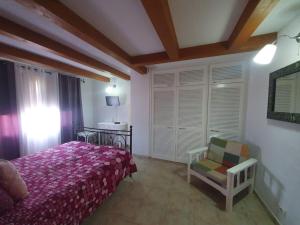 En eller flere senge i et værelse på casa moni 2 + 8 billeder