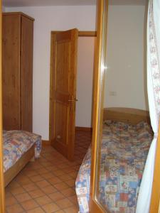 Postel nebo postele na pokoji v ubytování Residenza Al Castello