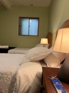 Postel nebo postele na pokoji v ubytování Hotel Nova Vida