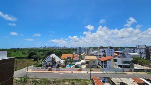 arial view of a city with buildings in the background at PERFEITO 1dorm, piscina, Intermares com garagem in Nossa Senhora do Livramento
