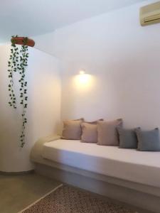 Voodi või voodid majutusasutuse Villa Solasta #2 with jacuzzi in Santorini toas