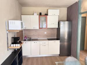 Køkken eller tekøkken på Egles Apartments Lignano Sabbiadoro Arena Beach + 18 billeder