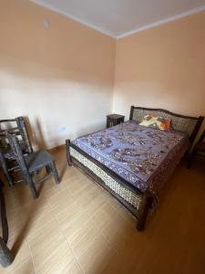 En eller flere senge i et værelse på La Emilia