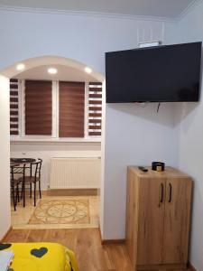 TV a/nebo společenská místnost v ubytování Merry Home