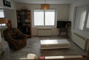 Et tv og/eller underholdning på Maison de la côte Saint Amand