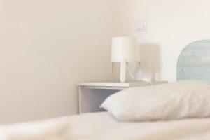 Postel nebo postele na pokoji v ubytování Csiki Hotel