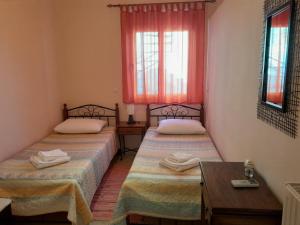 Posteľ alebo postele v izbe v ubytovaní Omorfi Poli 120 sqm Apartment