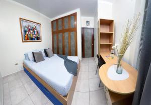 Katil atau katil-katil dalam bilik di Suite Jardín un hospedaje práctico y genial