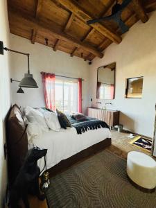 En eller flere senge i et værelse på Terradigaya