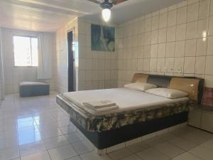 Ένα ή περισσότερα κρεβάτια σε δωμάτιο στο Hotel Extasy Brotas