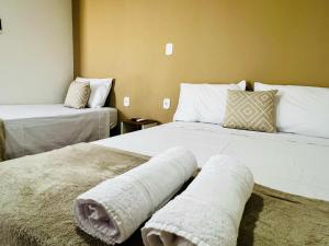 Postel nebo postele na pokoji v ubytování Top Flat Coruripe - Próximo ao Hospital Carvalho Beltrão