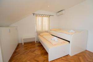 Postel nebo postele na pokoji v ubytování Villa Tia + 28 fotografií