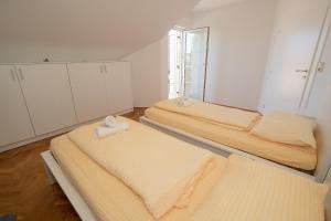 Postel nebo postele na pokoji v ubytování Villa Tia