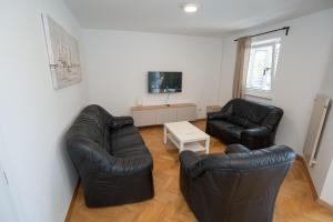 TV a/nebo společenská místnost v ubytování Villa Tia