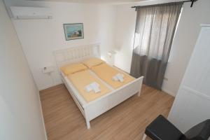 Postel nebo postele na pokoji v ubytování Villa Tia