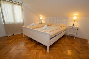 Postel nebo postele na pokoji v ubytování Villa Tia