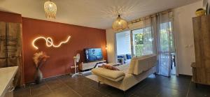 Et tv og/eller underholdning på Cocon de 50m2