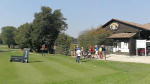 a group of people playing golf in a park at B&B San Gregorio in Cherasco