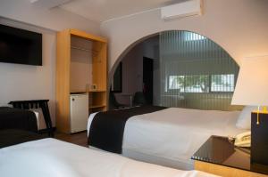 Katil atau katil-katil dalam bilik di Hotel Ferré Miraflores