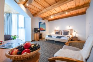 A bed or beds in a room at Boutique Hotel Vila Lieska