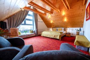 A seating area at Boutique Hotel Vila Lieska
