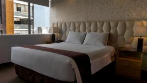 Katil atau katil-katil dalam bilik di Hotel Ferré Miraflores
