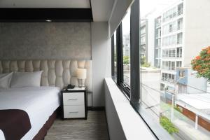 Katil atau katil-katil dalam bilik di Hotel Ferré Miraflores
