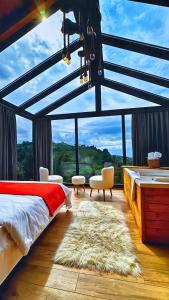 Postel nebo postele na pokoji v ubytování paradise valley bungalow