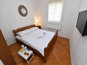 Postel nebo postele na pokoji v ubytování Villa Antonella