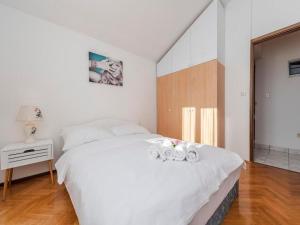 Postel nebo postele na pokoji v ubytování Villa Antonella