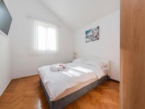 Postel nebo postele na pokoji v ubytování Villa Antonella