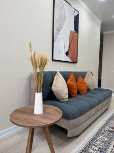 Khu vực ghế ngồi tại Almaty Aspan Comfort Apartment