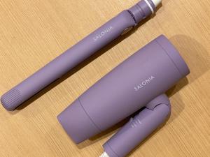 two purple wii controllers sitting on a table at Chill Fortuna Shimokitazawa Tokyo in Tokyo