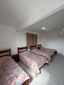Thiferer Hostel客房内的一张或多张床位