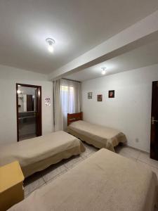 Thiferer Hostel客房内的一张或多张床位
