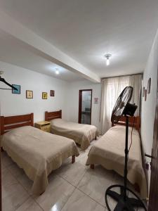 Thiferer Hostel客房内的一张或多张床位