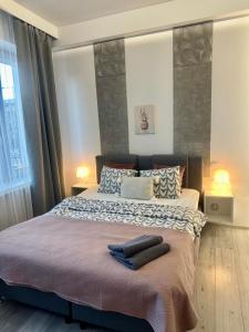 Posteľ alebo postele v izbe v ubytovaní Exclusive Apartments Smolna