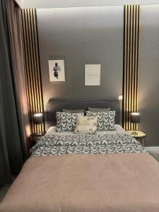 Posteľ alebo postele v izbe v ubytovaní Exclusive Apartments Smolna